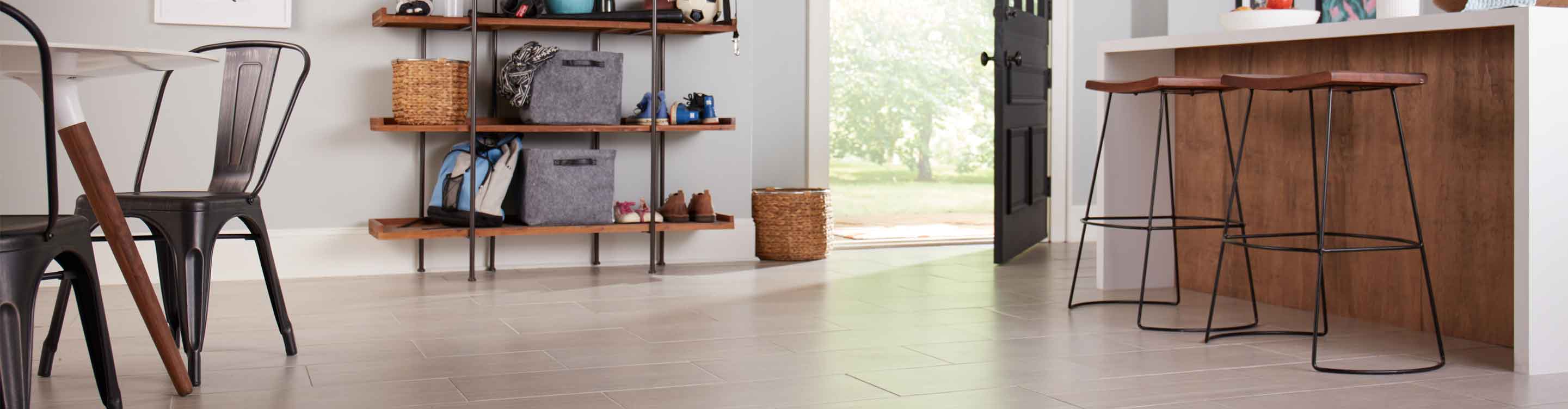 large-format wood look tile flooring in kitchen entryway